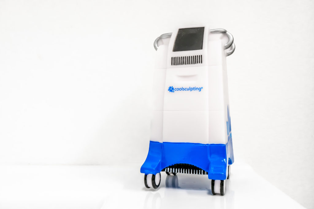 Coolsculpting machine model in a medspa clinic, on a white background. Used for cryolipolysis treatment to remove fat.